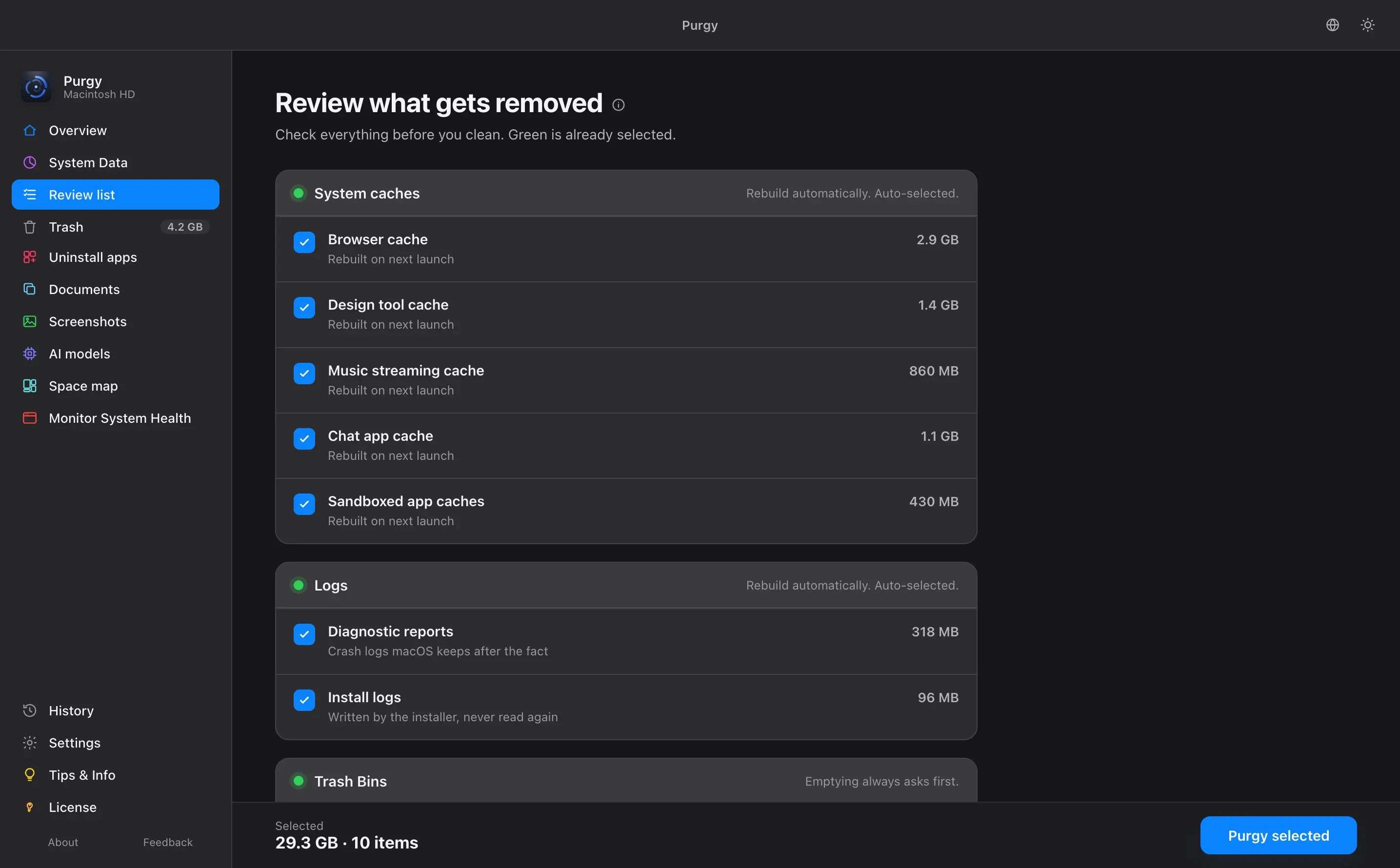 Review screen with green auto-selected items, amber items to review and locked red items